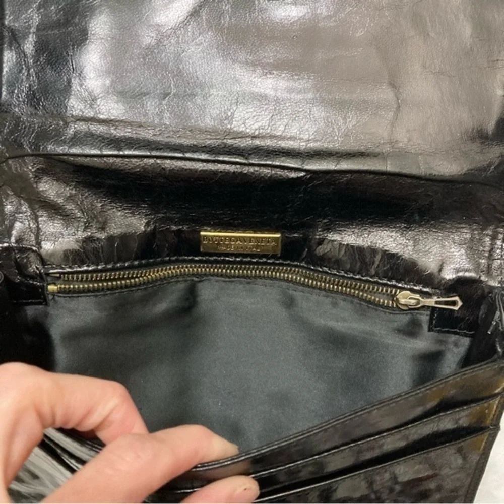 Bottega Veneta black Italian leather clutch bag